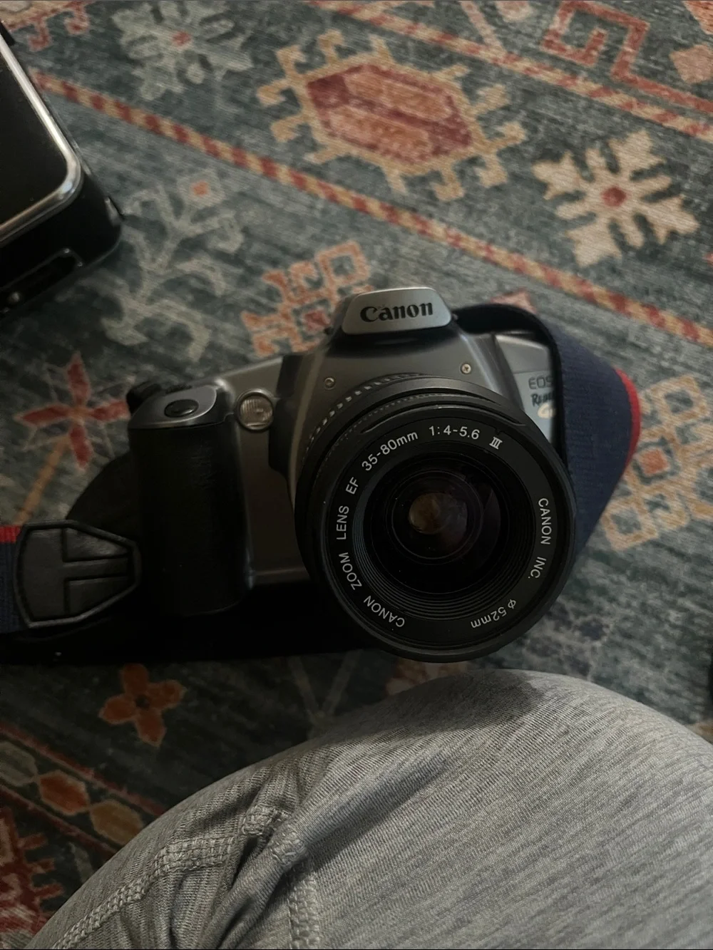 Not Tested/ Canon EOS Rebel Gii Camera in Black and Silver with Black Lens Cap